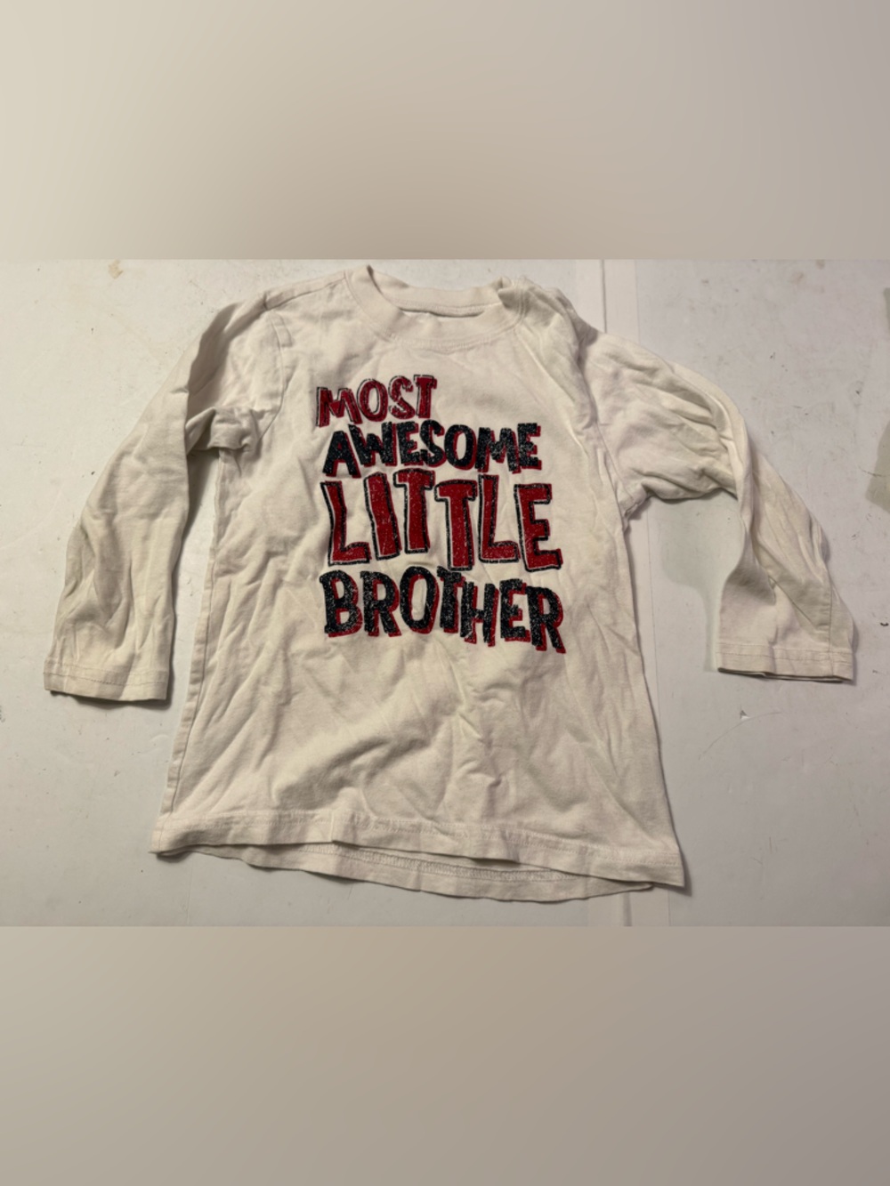 Kids White Long-Sleeve Tee - "Most Awesome Little Brother"